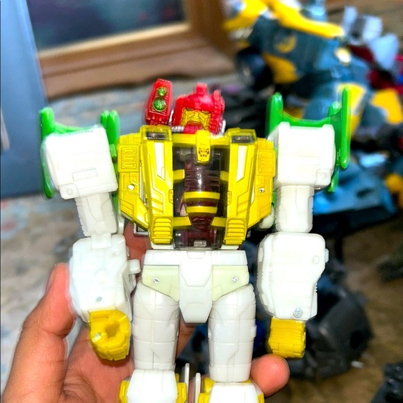 Transforming Robot Action Figure - Yellow, Red, Green - Picture 1 of 3